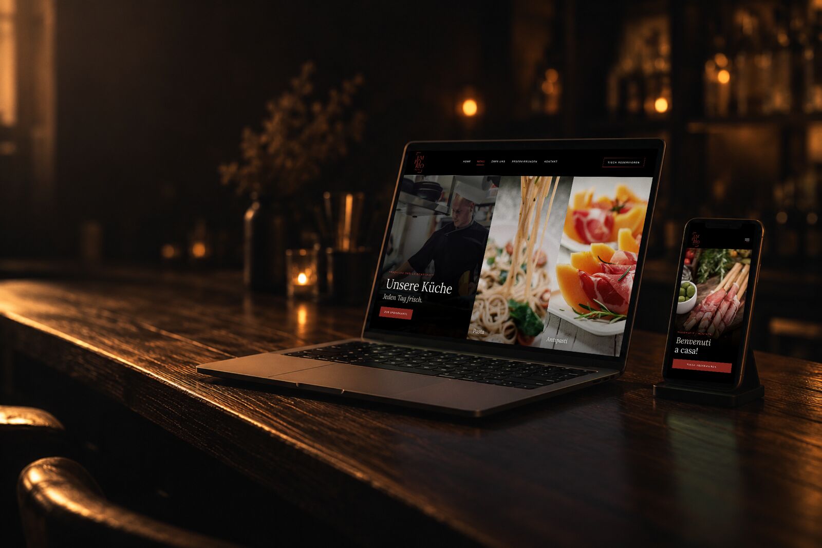Restaurant-Website des Emporio Italiano in München mit Küche, Pasta und Antipasti auf Laptop und Smartphone